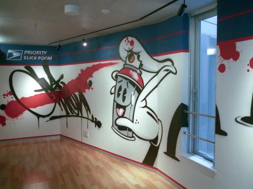 a room with a mural on the wall at The Aoca Tokyo Sanno in Tokyo