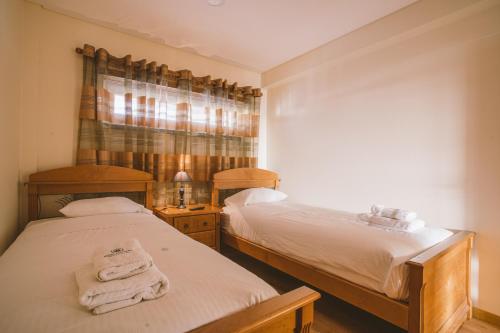 Ένα ή περισσότερα κρεβάτια σε δωμάτιο στο Best Houses 64 - Sunset Beach