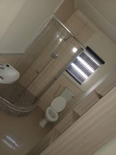 Ένα μπάνιο στο Comfy hidden home in Mthatha