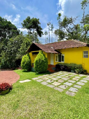 Un jardín fuera de Guddadamane Homestay