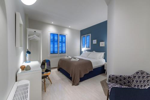 Postel nebo postele na pokoji v ubytování The Mansion - Kalamata Mediterranean Villas