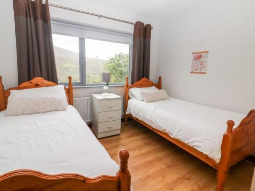 Postel nebo postele na pokoji v ubytování Lyreboy
