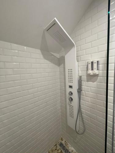 Ένα μπάνιο στο Appartement hors du commun avec son jacuzzi