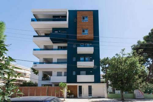 Teal Faliro House by UPSTREET