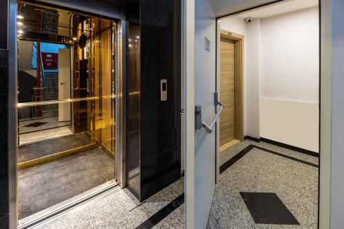 an elevator door in a building with a hallway at Monnas Suite in Istanbul