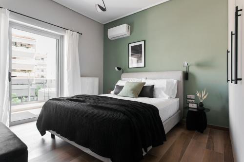 Teal Faliro House by UPSTREET