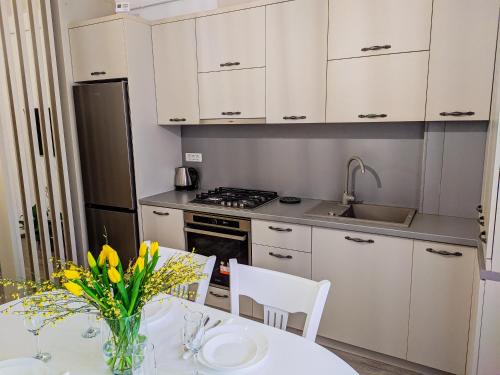 Кухня или мини-кухня в Apartment Alexa
