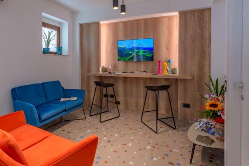 TV a/nebo společenská místnost v ubytování Macramè Fazello Rooms