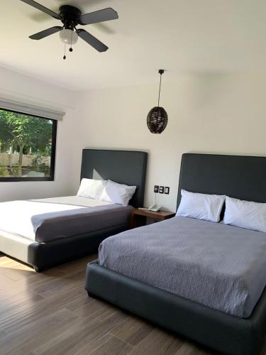 Postel nebo postele na pokoji v ubytování Mar De Estrellas - Hotel
