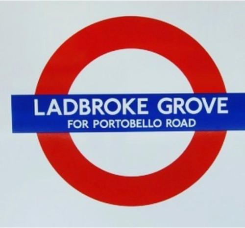 a sign for aldridge grove for portobello road at Portobello Living in London