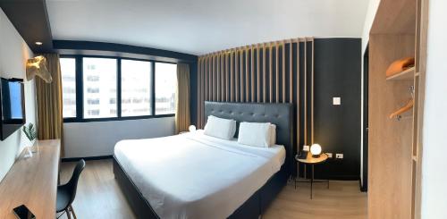 Postel nebo postele na pokoji v ubytování Hotel San Francisco de Asís