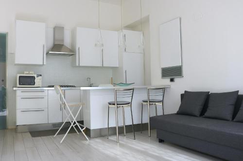 Kuchyň nebo kuchyňský kout v ubytování Design Canal Apartment