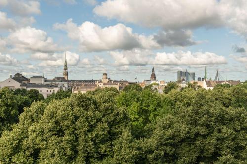 a skyline of a city with trees and buildings at Radisson Blu Elizabete Hotel, Riga in Rīga
