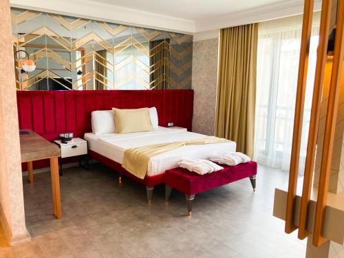 Ένα ή περισσότερα κρεβάτια σε δωμάτιο στο NENESSAHOTEL