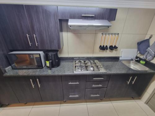 Kuchyň nebo kuchyňský kout v ubytování Weston Guest House Krugersdorp