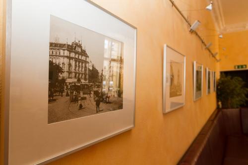 a picture of a building on a wall at Hotel Spreewitz am Kurfürstendamm in Berlin