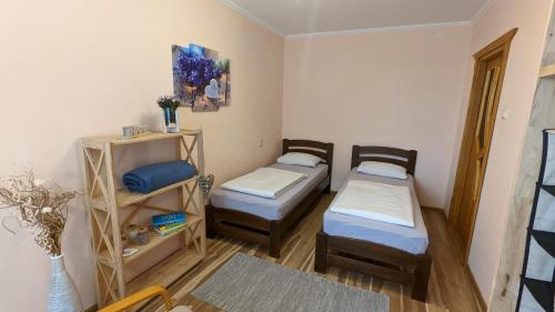 Кровать или кровати в номере Comfy Apartment “Family Estate”