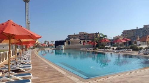 Swimming pool sa o malapit sa Chalet lake view in Porto Sharm El sheikh