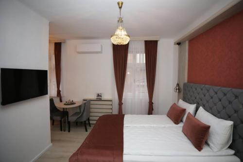 Ένα ή περισσότερα κρεβάτια σε δωμάτιο στο Apartments Artee Free Garage Parking