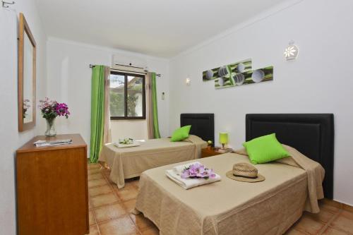 Postel nebo postele na pokoji v ubytování Villa Laranja do Sul by Villa Plus
