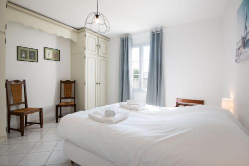 Postel nebo postele na pokoji v ubytování Grande Villa familiale "Coquelicot"