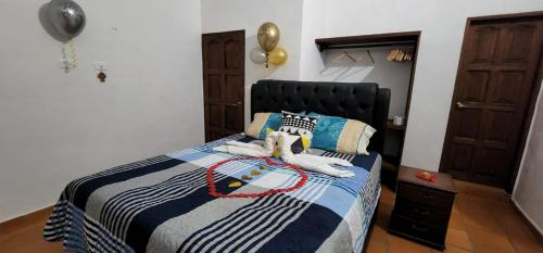 Ein Bett oder Betten in einem Zimmer der Unterkunft Glamping Valley Barichara