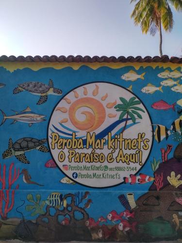 a mural of the pacific marlins and aquarium at Peroba Mar Kitnets in Maragogi