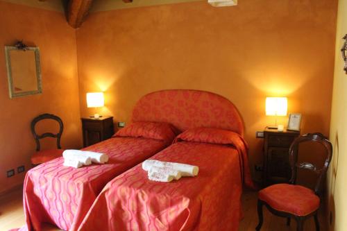 A bed or beds in a room at Holiday home Ca' del Cinema