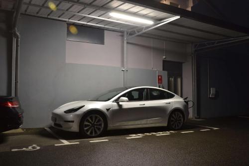 a white car parked in a parking garage at Best Western Plus Hotel Kregenn in Quimper