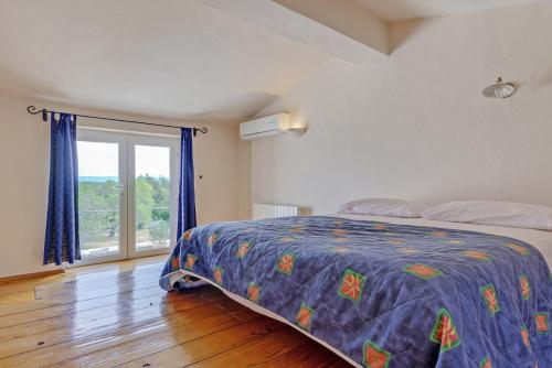 Posteľ alebo postele v izbe v ubytovaní Villa Arbora in Kavran (Haus für 10 Personen)