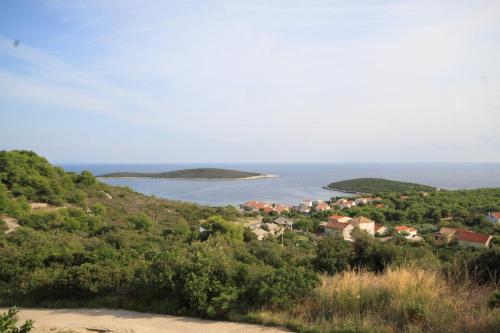 a view of a town and islands in the water at Apartments with parking space Rukavac, Vis - 8839 in Rukavac