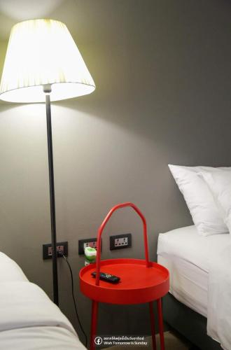 Postel nebo postele na pokoji v ubytování Get GuestHouse 2 ( Sangsri soi 4)
