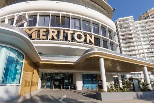 a large building with a meridian sign on it at Meriton Suites Surfers Paradise in Gold Coast