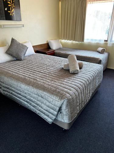 Cama o camas de una habitación en Y Motels Gympie