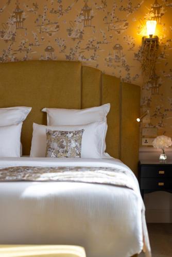 Ein Bett oder Betten in einem Zimmer der Unterkunft Manolita Paris