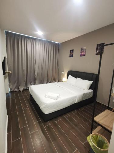 Ένα ή περισσότερα κρεβάτια σε δωμάτιο στο Hotel Mutiara