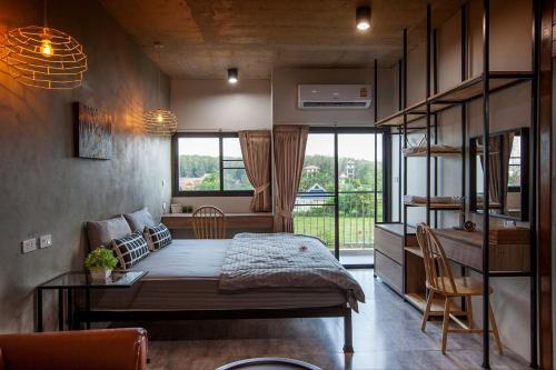 Postel nebo postele na pokoji v ubytování Be Live Residence