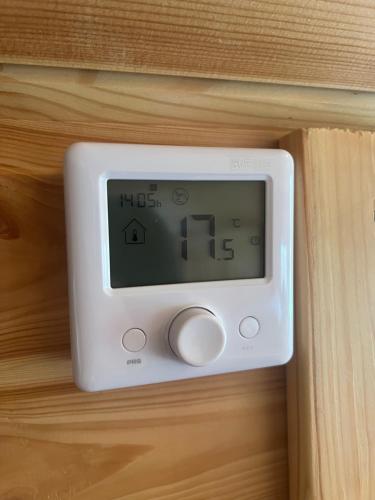 an alarm clock sitting on a wooden drawer at The Hobbit Hole in Zelah