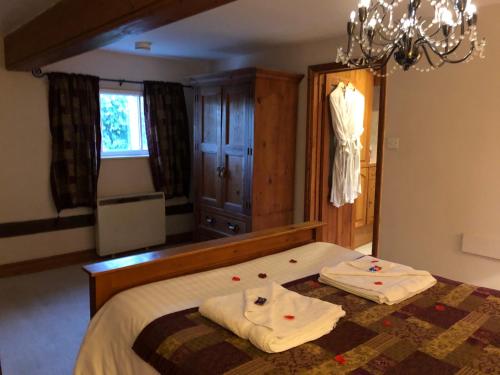 Cama o camas de una habitación en The Walnuts Country House