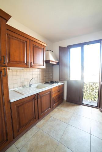 Η κουζίνα ή μικρή κουζίνα στο WEST SARDINIA APARTMENT 3