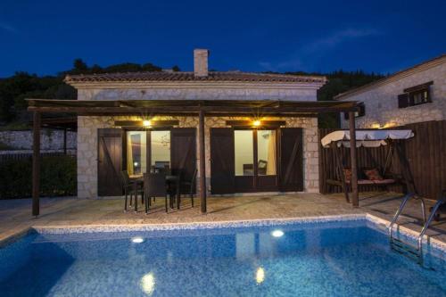 Πισίνα στο ή κοντά στο Amadryades Villas-Villa Terina