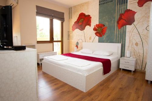Postel nebo postele na pokoji v ubytování Guest House Arima