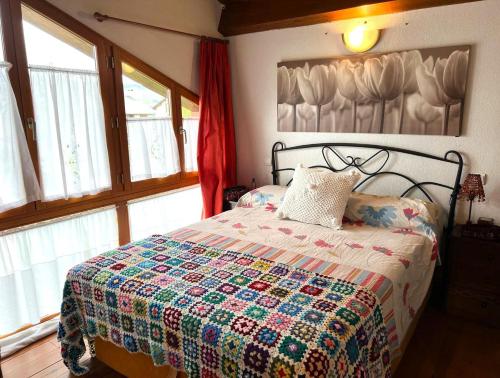 Postel nebo postele na pokoji v ubytování Casa adosada para familias en Santa Leocadia