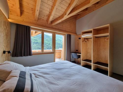 Postel nebo postele na pokoji v ubytování Sole Penthouse
