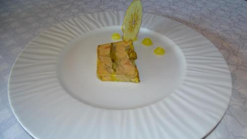 a piece of cake on a white paper plate at Hotel Restaurante La Glorieta in La Seu d'Urgell