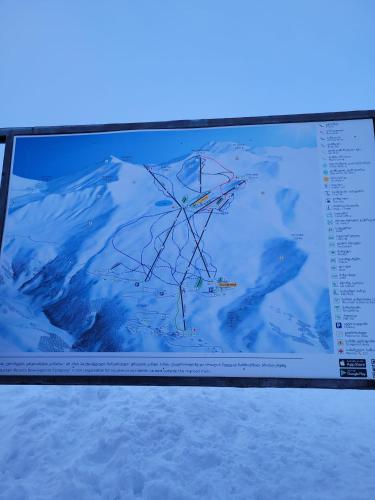 a computer screen with a map on it at 7 Senses Luxury Apartment in Gudauri