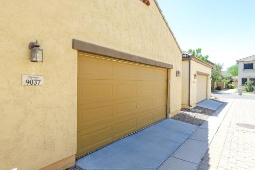 a pair of garage doors on the side of a building at Piece of Provence in Glendale