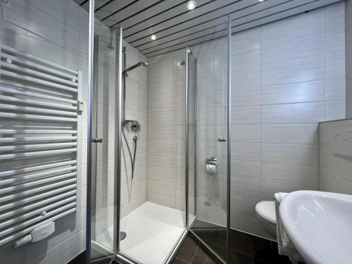 a bathroom with a shower and a sink at Berolina 519 - Ostsee Weitblick in Dahme