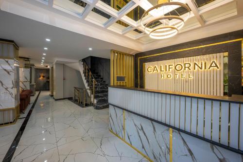 a lobby of a hotel with a sign that reads california hotel at Hotel California in Istanbul