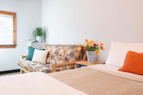 Ένα ή περισσότερα κρεβάτια σε δωμάτιο στο Mad River Lodge